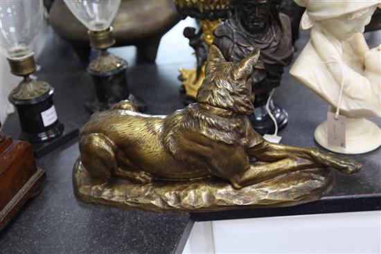 L. Riche. A gold patinated bronze model of a seated Alsatian, 21in.